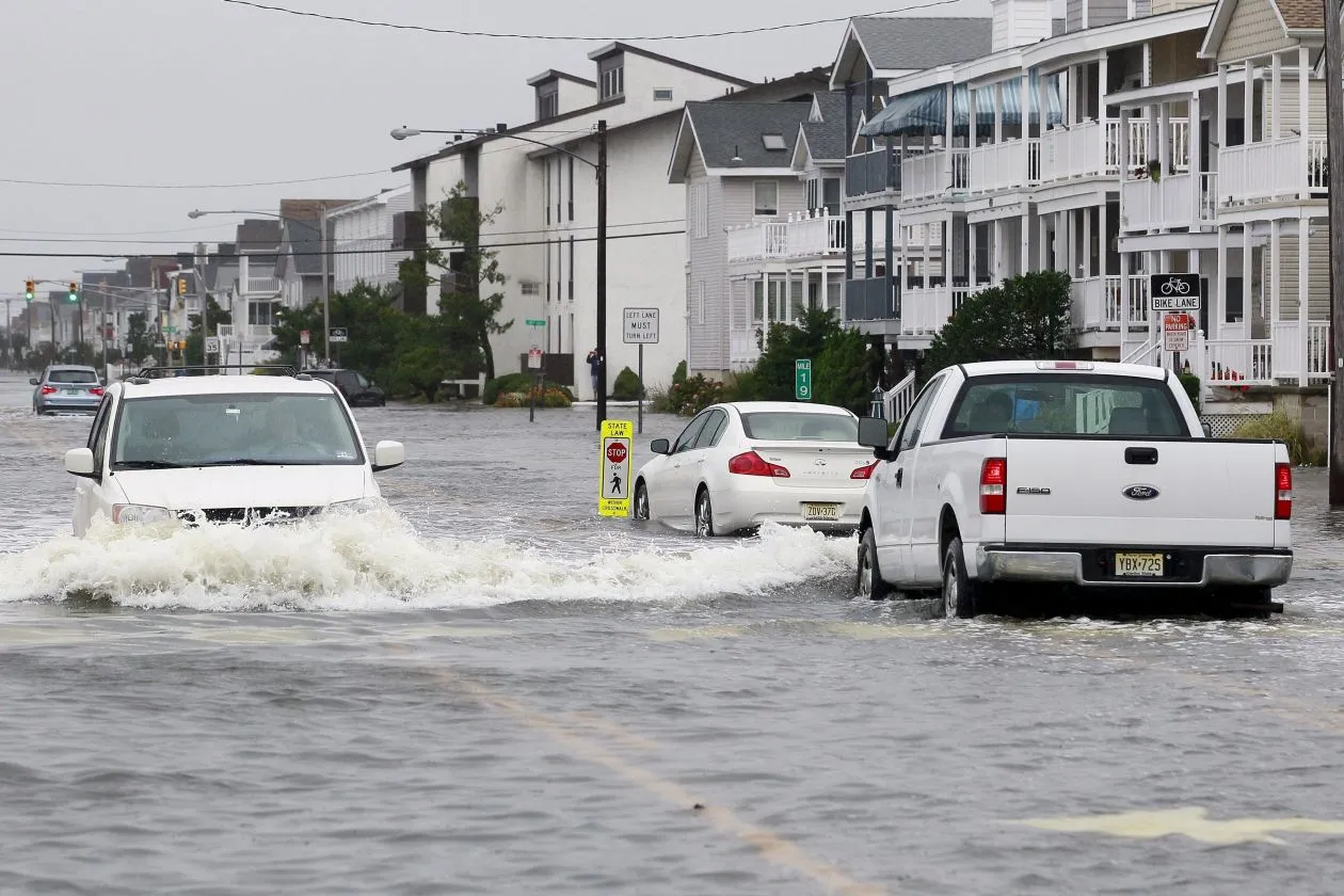 car going through a flooded area
