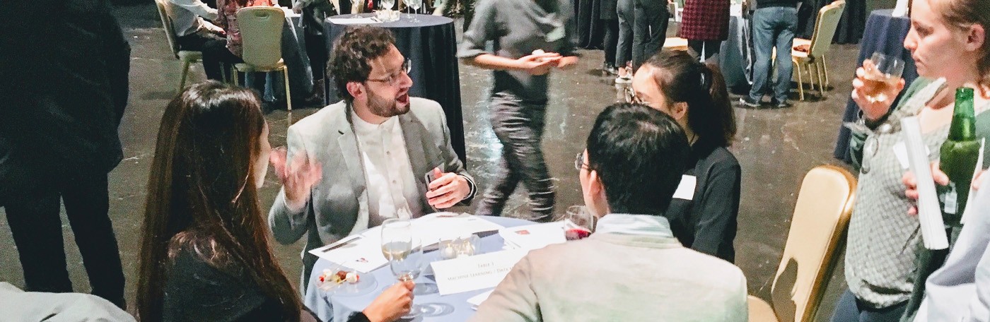 Columbia affiliates socializing at an event